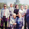 Robert Kreem and Helene Johani visited Alberta on June 19, 1965 to collect historical material about Alberta's Estonian community and Alberta's Estonian pioneers. Robert Kreem is standing on the far right, Mrs. Johani is kneeling in front.