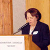 Eda McClung addresses the Estonian Independence Day gathering at the Highlands Golf Club, Edmonton, Alberta in 2002. Estonian Charge d'Affaires Sulev Roostar from Ottawa and Chief Justice of the Court of Queen's Bench of Alberta were guest speakers. 