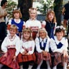 Colourful skirts highlight traditional Estonian clothing. This photo was taken at the West Coast Estonian Days in Portland, Oregon in 1985.