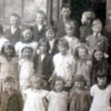 About a dozen Estonian children are in this group, including two Silberman kids: Helmi (second row to the left) and  Ernest (third from the right side in second row). Three Kotkas children,  and the Kulpas children are likely in the photo.  