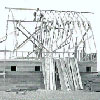 Construction of farm buildings was a huge job for settlers. Building materials were available in the nearest village, i.e. Barons. Pictured is a barn being built by G.J. Erdmanin 1918. Neighbours would help to build the barn. Cows and horses were fed and sheltered here, especially in winter.