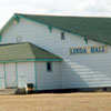 Pictured is the front of Linda Hallnear Stettler. The Hall was built by Estonian settlers in 1911. A century later, in 2011, it continues as a community hall for all residents in the region. 
