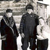 Milna and George Lustwerk, flanked by granddaughters Evelyn (left) and  Loretta (right) in front of their home in Bonanza, Alberta in 1946.