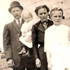 L to R: Martin holding Maria, mother Maria, Martha, Salmea, Jaan and Edward in the Stettler, Alberta area in 1915.