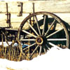 The wooden wagon was used to haul grain to bins and elevators in the village. First elevators were built in 1908.Three lumber yards in Barons provided building materials for town folk and surrounding farms. A rounded version of the wagon was used for hauling water from the irrigation canal or Keho Lake. Farms usually had a cistern and a kitchen hand pump. Weekly bathing was common due to shortage of water.