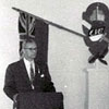Independence for Estonia Association in Edmonton (Eesti Vabadusvõitleja Ühing)was established by August Kivi. The Association was active in the 1950s, sponsoring meetings and social events. In the attached image, Association President August Kivi is at the podium. The wall hangings and plaques were made by the Kivi family.