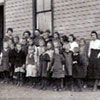 Students and a teacher in front of Estonian School near Gilby, Alberta in the 1940s.